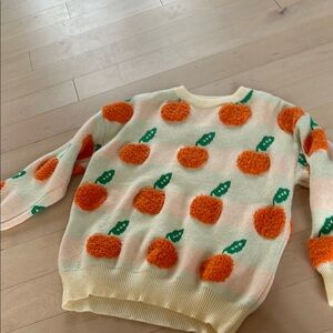 Women’s or girls tangerine sweater